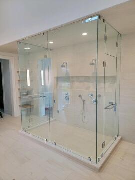 Another view of the custom frameless glass shower, installed by Great Lakes Glass in Cleveland, Ohio