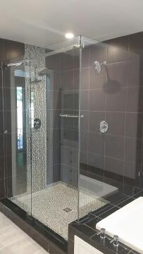 Frameless glass shower enclosure installed by Great Lakes Glass in Cleveland, Ohio