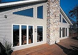 Custom angled house windows installed by Great Lakes Glass