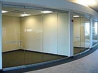 Custom curved glass office walls by Great Lakes Glass